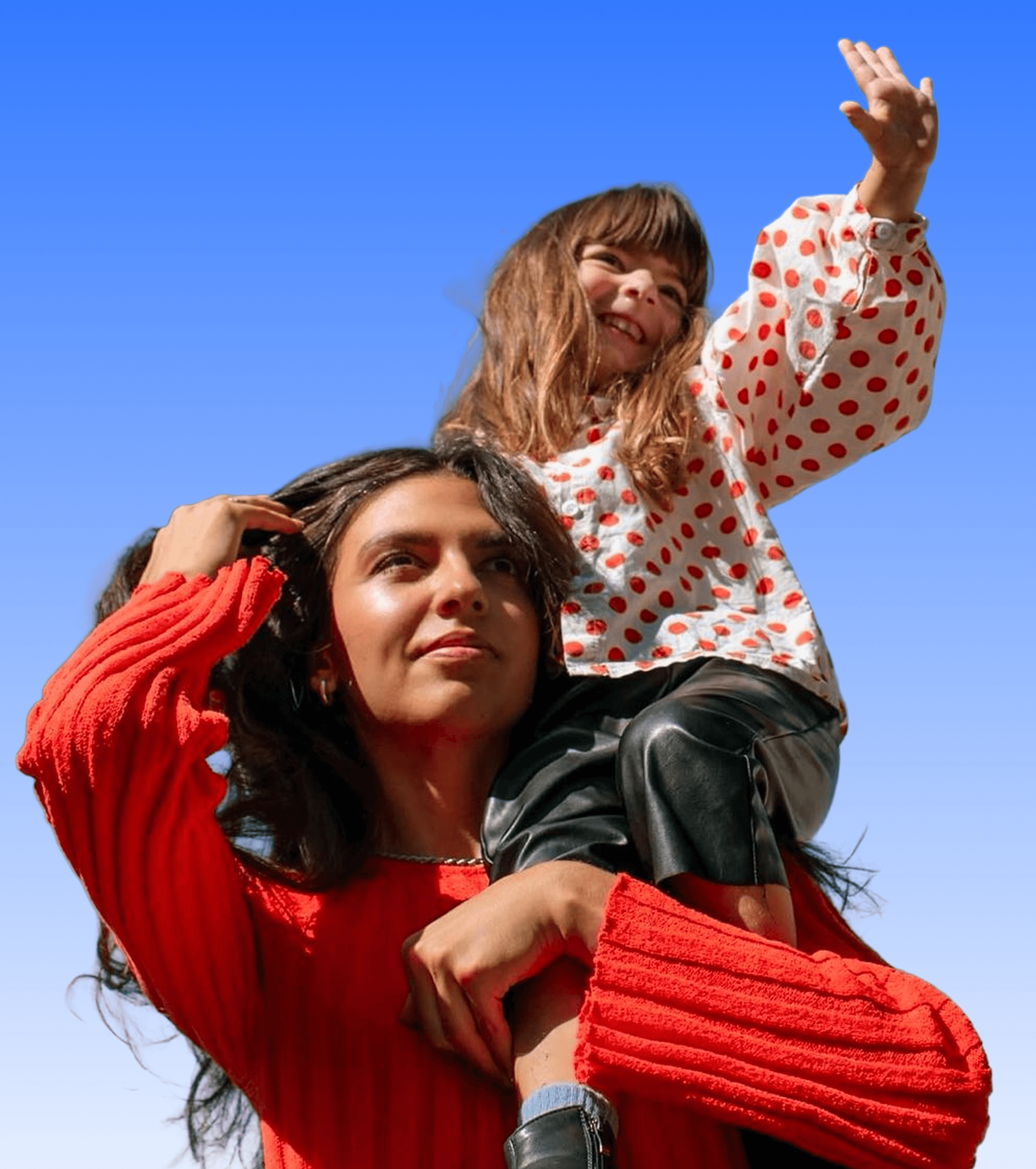 A parent carrying a smiling child